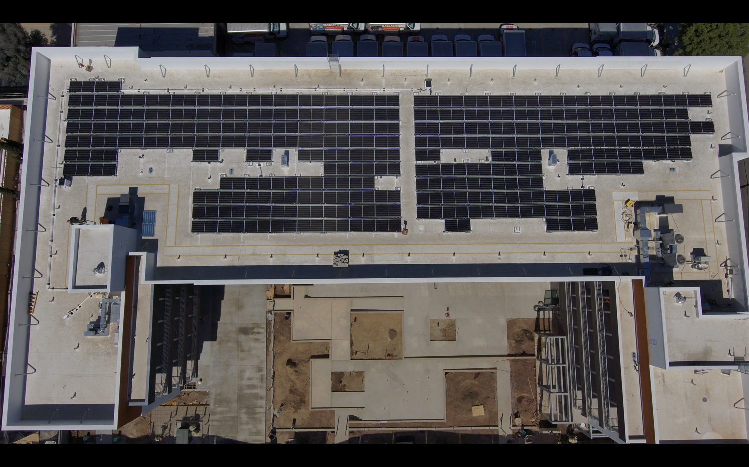 Residential rooftop solar array, drone view