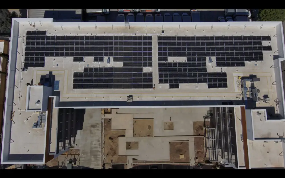 Residential rooftop solar array, drone view